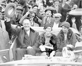 Franklin D Roosevelt traveling by car with daughter Anna Roosevelt Halsted (center) and Eleanor Roosevelt, Warm Springs, GA, 10/24/1932.