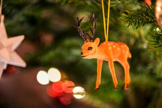 Miniature Reindeer hanging in Christmas Tree
