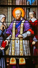 Stained Glass in the Church of Saint Severin, Latin Quarter, Paris, France, depicting Saint Francois de Sales, bishop of Geneva.