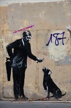 An artwork by street artist Banksy in Paris, France