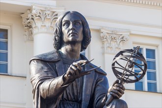 The Statue of astronomer Nicolaus Copernicus in Warsaw Poland, who who formulated a model of the universe that placed the Sun rather than the Earth