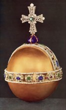 The Sovereign's Orb, 1661. The Orb is a representation of the sovereign's power. It symbolises the Christian world with its cross mounted on a globe. It is part of the Coronation Regalia of the United...