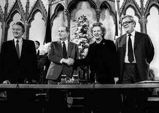 Prime Minister Margaret Thatcher signs the Chunnel Channel Tunnel Agreement with President Francois Mitterand of France February 1986
