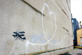 Banksy graffiti artwork on display in Liverpool, UK.