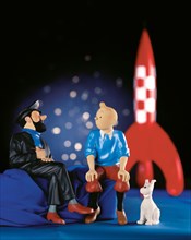 figurines shows the cartoon character, Captain Haddock ,Tintin and his dog Snowy,
