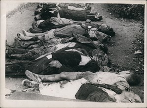 Nov. 11, 1937 - Bodies laid out for burial after Insurgent planes had bombed a school in Barcelona during Spanish civil war. Cr