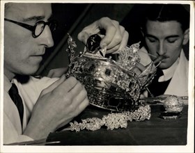 Mar. 20, 1953 - Alterations To The Imperial State Crown.. Preparing For Coronation of Queen Elizabeth. Alterations are being carried out to the famous Imperial State Crown - the crown that Her Majesty...