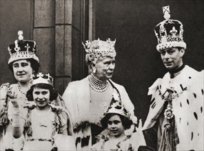 King George VI and his wife Queen Elizabeth seen here on the balcony at Buckingham Palace, London, England the day of their coronation, 12 May, 1937, with their daughters Princess Margaret and Princes...