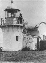 2 45255 Lighthouse keeper on the observation platform of Fingal Head Lighthouse, New South Wales, ca. 1906