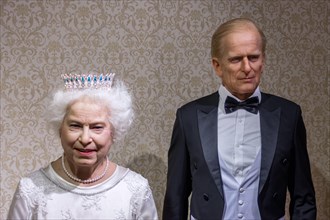 Wax statues of Queen Elizabeth II and Prince Philip at the Krakow Wax Museum - Cracow, Poland.