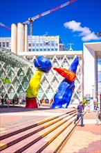 "Personnages Fantastiques" is a colourful outdoor artwork and represent two dancers playing together amongst the high-rises at La Defense,Paris,