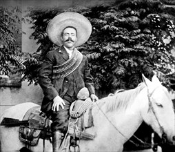 Pancho Villa. Portrait of the Mexican revolutionary general, Francisco "Pancho" Villa (b.  José Doroteo Arango Arámbula, 1878-1923) on horseback, c. 1908-1919