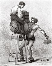 Hercules jaw lifting a barrel loaded with a man. Old 19th century engraved illustration from La Nature 1885