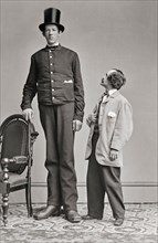 James Hugh Murphy Jr (1842-1875) was born in Waterford, Ireland and died in Baltimore, USA. Known as the Irish Giant and the Baltimore Giant, he toured with P.T. Barnum, being billed as being over 8' ...