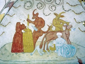 16th century mural depicting horned devils in the medieval St. Lawrence Church in Lohja, Finland