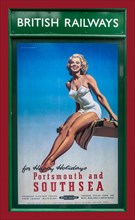 Vintage retro 1950's British Railways holiday poster with girl in swimsuit promoting 'happy holidays' in Portsmouth and Southsea UK