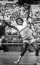 Yannick Noah celebrates after winning the 1983 French Open final at Roland Garros.