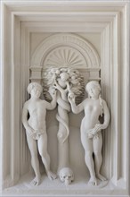 Adam and Eve. Plaster cast of the relief from the Renaissance altarpiece by German sculptor Johann Brabender (1546) from the Hildesheimer Domlettner on display in the Cathedral Museum (Dom Museum) in ...