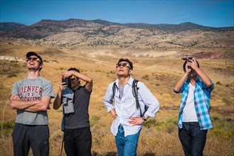 Eye protection during Total solar eclipse 2017, in the Painted Hills, in eastern Oregon,USA,   John Day Fossil Beds National Monument