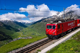 The train Glacier Express, connecting the two major mountain resorts of Zermatt and St. Moritz via Andermatt in the central Swiss Alps.