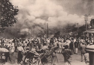 Japan Earthquake 1923: The tramway crossing outside Hibiya Park, enveloped & levelled to the ground by flames soon after the severe shock of Sept. 1
