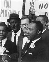 Dr. Martin Luther King, Jr. (right), President of the Southern Christian Leadership Conference with Mathew Ahmann (center), Executive Director of the National Catholic Conference for Interrracial Just...