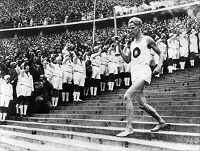 Aug. 2, 1936 - Berlin, Germany - The Olympic flame carried by a German athlete during the opening ceremony of the Olympic Games in Berlin Germany. (Credit Image: © KEYSTONE Pictures USA/ZUMAPRESS.com)