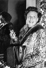 Film-maker Leni Riefenstahl getting ready to go out