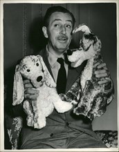 Jul. 07, 1953 - Walt Disney introduces his newest characters ''The Lady'' and ''The Tramp''. A couple of Dogs.: World famous Hollywood cartoonist Walt Disney was to be seen in London today introducing...