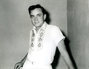 JOHNNY CASH (1932-2003) American Country musician about  1956