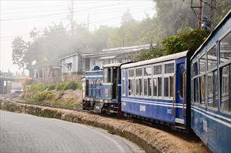Darjeeling Himalayan Railway, Toy Train climbing a steep slope on a curve.