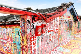 TAICHUNG, TAIWAN - JUL 11: Colorful graffiti dots the walls of the famous Rainbow Village in Taichung July 11, 2013. The village