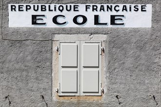 Vintage facade of a school from the French republic