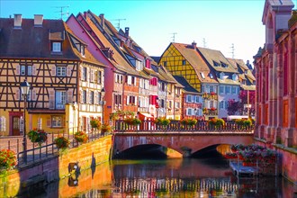 Beautiful late summer afternoon view of traditional colorful half-timbered buildings in the historical old town of Colmar, Alsace wine region in Franc