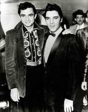 (Archival Classic Cinema - Elvis Presley Retrospective) Elvis Presley and Johnny Cash, circa 1955. File Reference # 31616_042THA