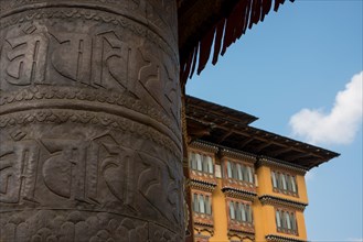 Bhutan, Thimphu, capital of Bhutan. Five-star luxury hotel, Taj Tashi Hotel, located in downtown Thimphu. Back courtyard prayer wheel.