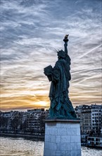 Sunset over Replica of the Liberty Statue in Paris