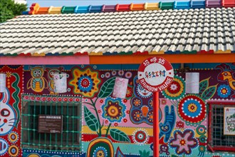 Rainbow village. A popular travel destination where people can view colorful paintings and illustrations on the walls. Taichung, Taiwan