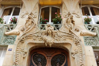 Art Nouveau doorway at 29 Avenue Rapp by architect Jules Lavirotte (1864-1929), Paris, France