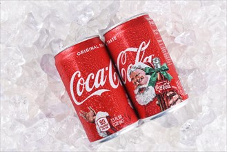 IRVINE, CALIFORNIA - DECEMBER 17, 2017: Two cans of Coca-Cola Christmas cans. The limited edition cans feature Santa Claus for the Holiday Season.