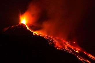 Etna volcano eruption with lava flow at night - Sicily adventures