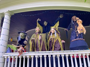 Scary Halloween installation on the porch of a large victorian house in the Flatbush neighborhood of Brooklyn New York.