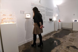 Museum of Broken Relationships: visitors watching the collection. Zagreb, Croatia
