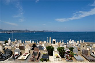 Cross at coastal cemetery St Tropez, South of France