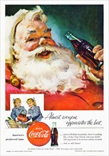 Classic Coca Cola advert in American magazine featuring colour illustration of Santa Father Christmas dated December 1955