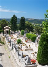 Cemetery just outside the walls of the medieval hill town of St Paul de Vence, Provence, France, Europe