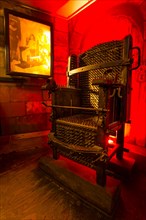The Inquisition Chair exhibited in the Torture Museum in Amsterdam, The Netherlands, Europe.