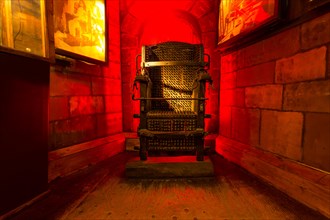 The Inquisition Chair exhibited in the Torture Museum in Amsterdam, The Netherlands, Europe.