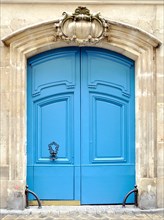 A blue door in Paris, France