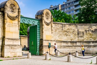 The gates of Père Lachaise Cemetery which is the largest cemetery in the city of Paris, France
